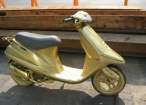 Golden Blinging Scooter.jpg