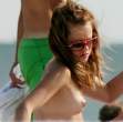 mena_suvari-beach_topless_09.jpg