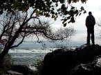Man Standing By River.jpg