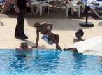 60902_Rihanna_Relaxing_by_the_Hotel_Pool_in_Tel_Aviv_May_29_2010_03_122_540lo.jpg