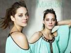 1250756704_1024x768_marion-cotillard-in-green-dress.jpg
