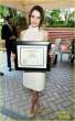 555791859_EmiliaClarkeAFIAwardsinBeverlyHillsMQtag_011312_05_122_113lo.jpg