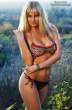 217216372_GenevieveMortonSISwimsuitIssue2012_26_122_415lo.jpg