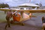 L7208-003 Vern Tegland gets hand-propped.jpg