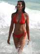 padma-lakshmi-in-an-orange-bikini-at-the-beach-07-435x580.jpg