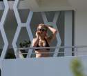 973122180_ritaorahangsoutbalconyx30_123_567lo.jpg
