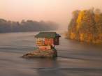 House-perched-above-a-river-Serbia.jpg