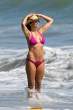 Lisa Rinna  sports a hot pink bikini while on the beach in Malibu. Aug 22, 2010 (4).jpg