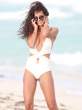 Raffaella-Modugno-Wears-A-White-One-PIece-Thong-To-The-Beach-In-Miami-06-675x900.jpg