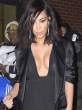 Kim-Kardashian-Deep-Shiny-Cleavage-In-Black-Heading-To-See-Kanye-At-SNL-40th-Anniversary-04-675x900.jpg