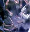 hippie-commune-sharing-joint.jpg